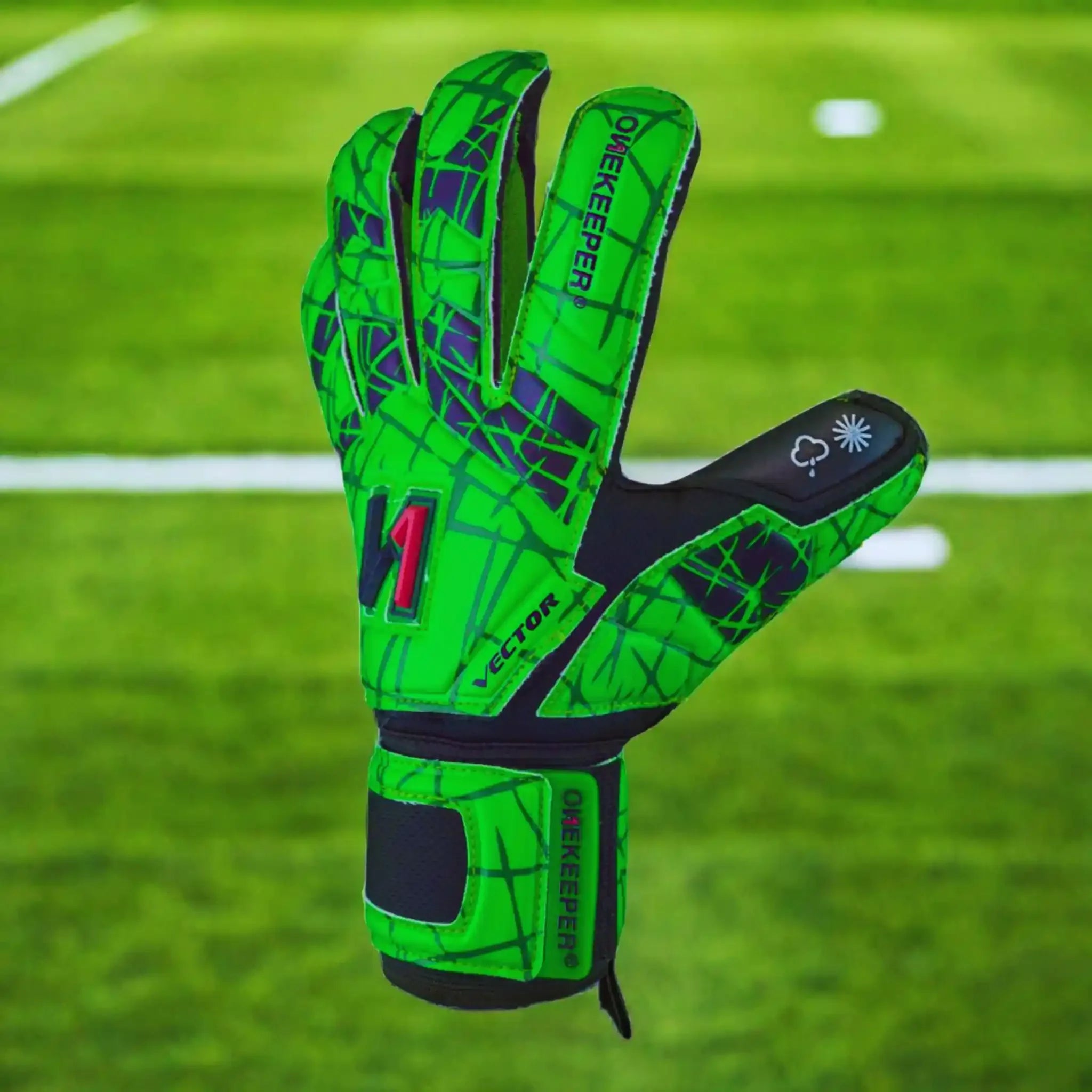 ONEKEEPER USA neon green goalkeeper glove with black pattern displayed on a soccer field