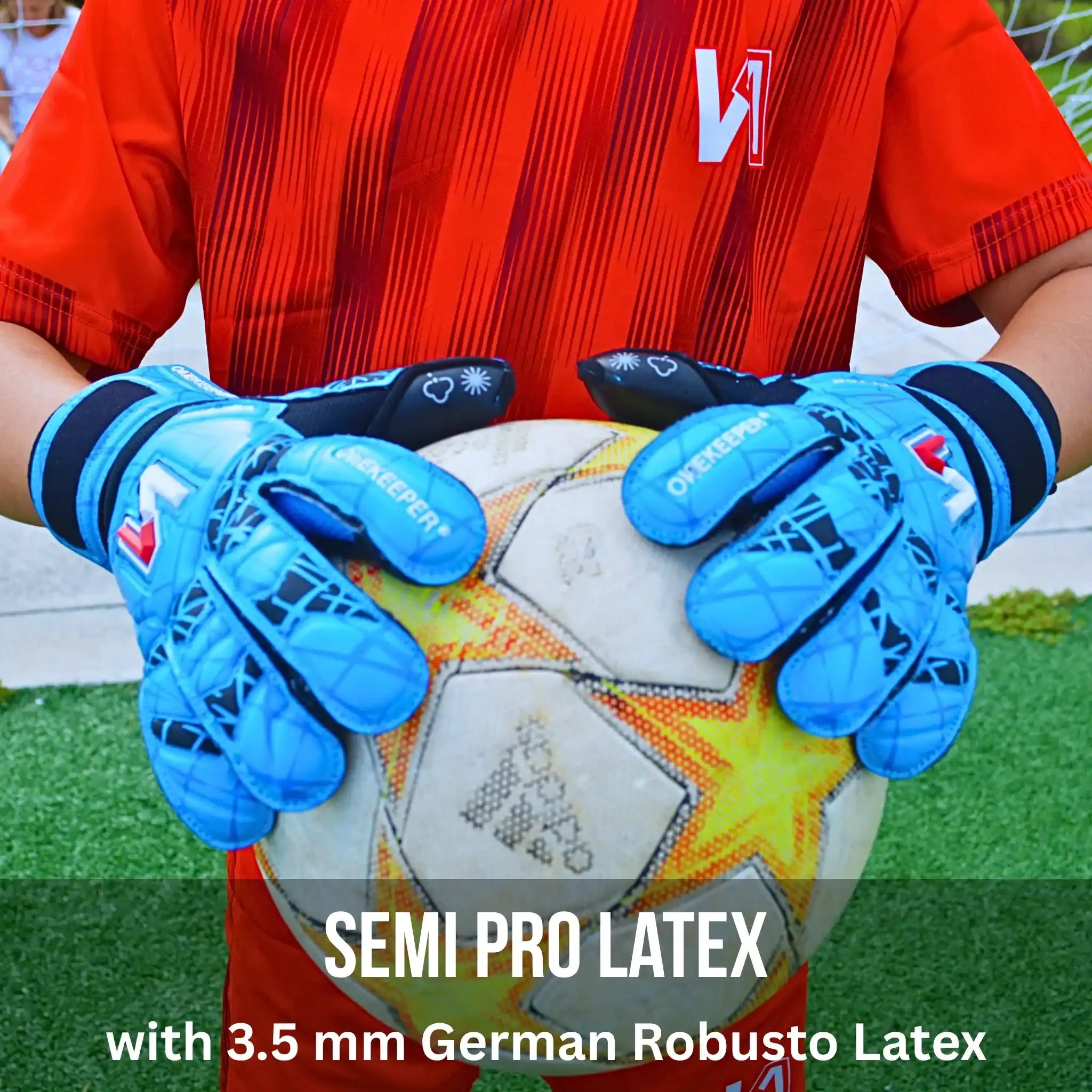 Person wearing ONEKEEPER Vector Evolution blue semi-pro latex gloves holding a soccer ball on a grass field.