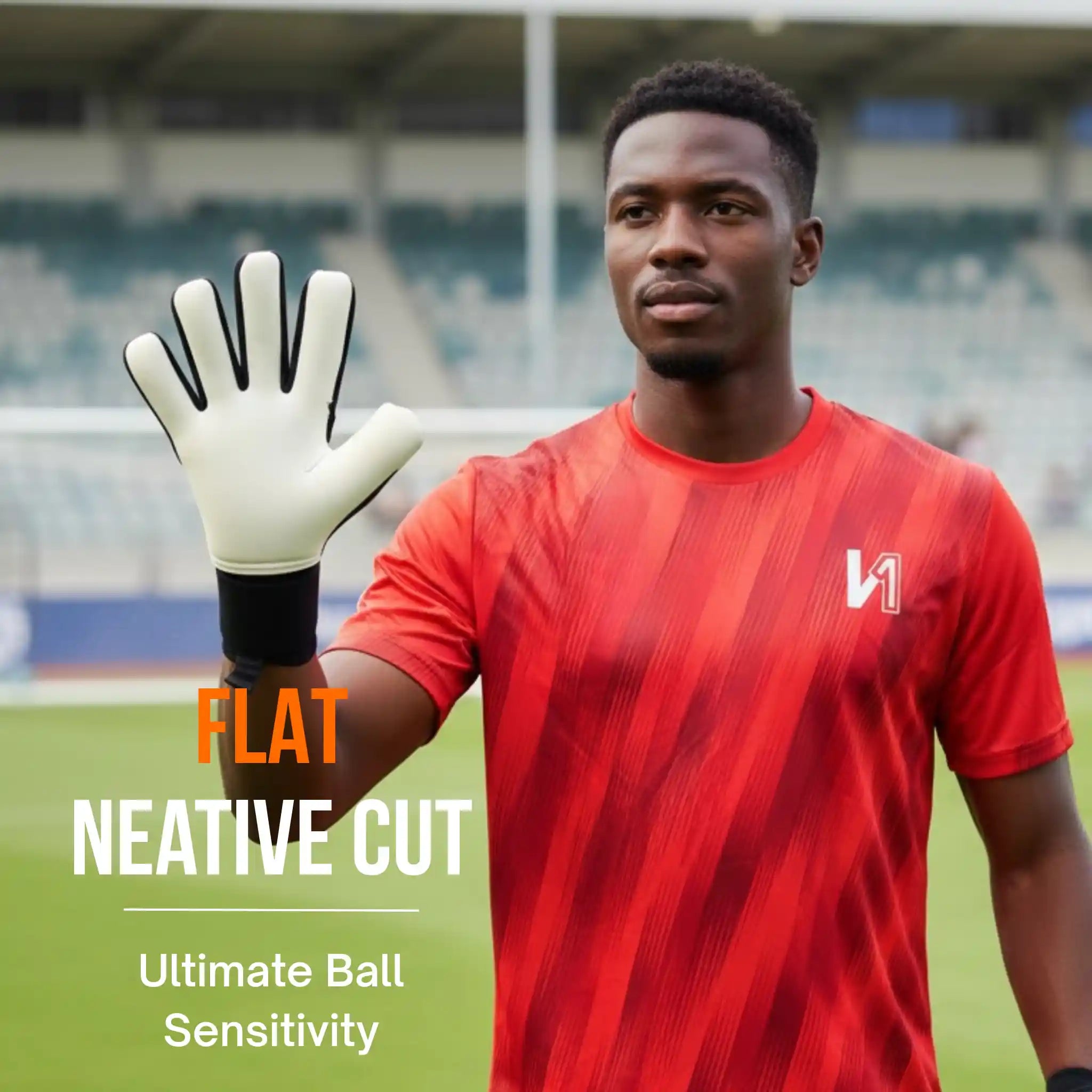 Soccer goalkeeper in red jersey with a onekeepera ACE black and white glove on a sports field