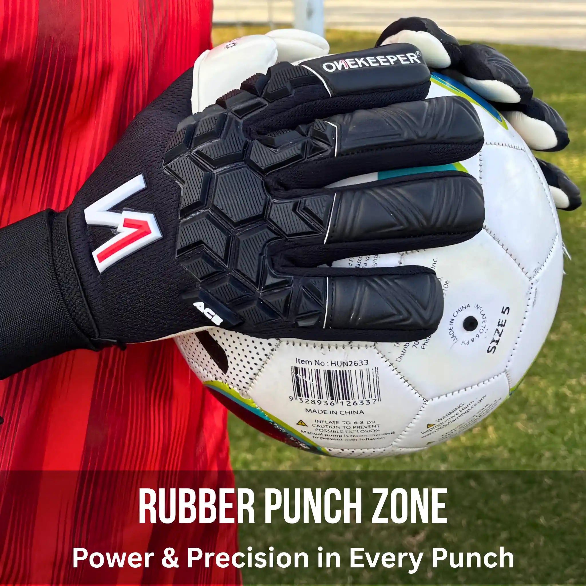 ONEKEEPER ACE BLACK AND WHITE Goalkeeper glove with 'Onekeeper' branding holding a soccer ball on grass.