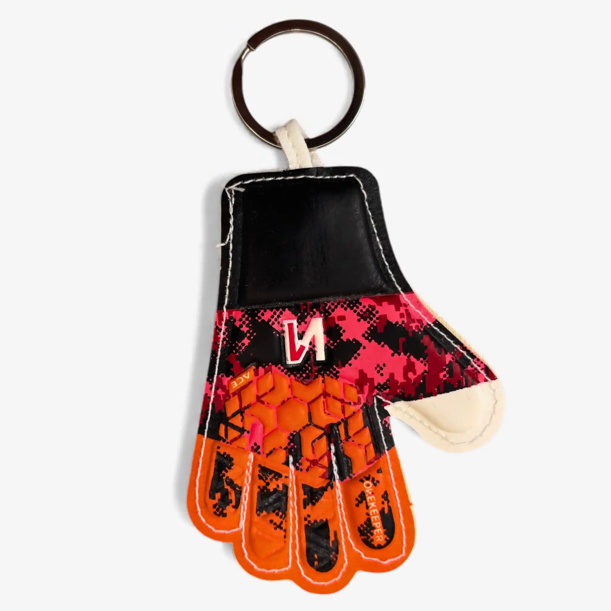 Glove-shaped keychain with red, black, and orange design on a white background
