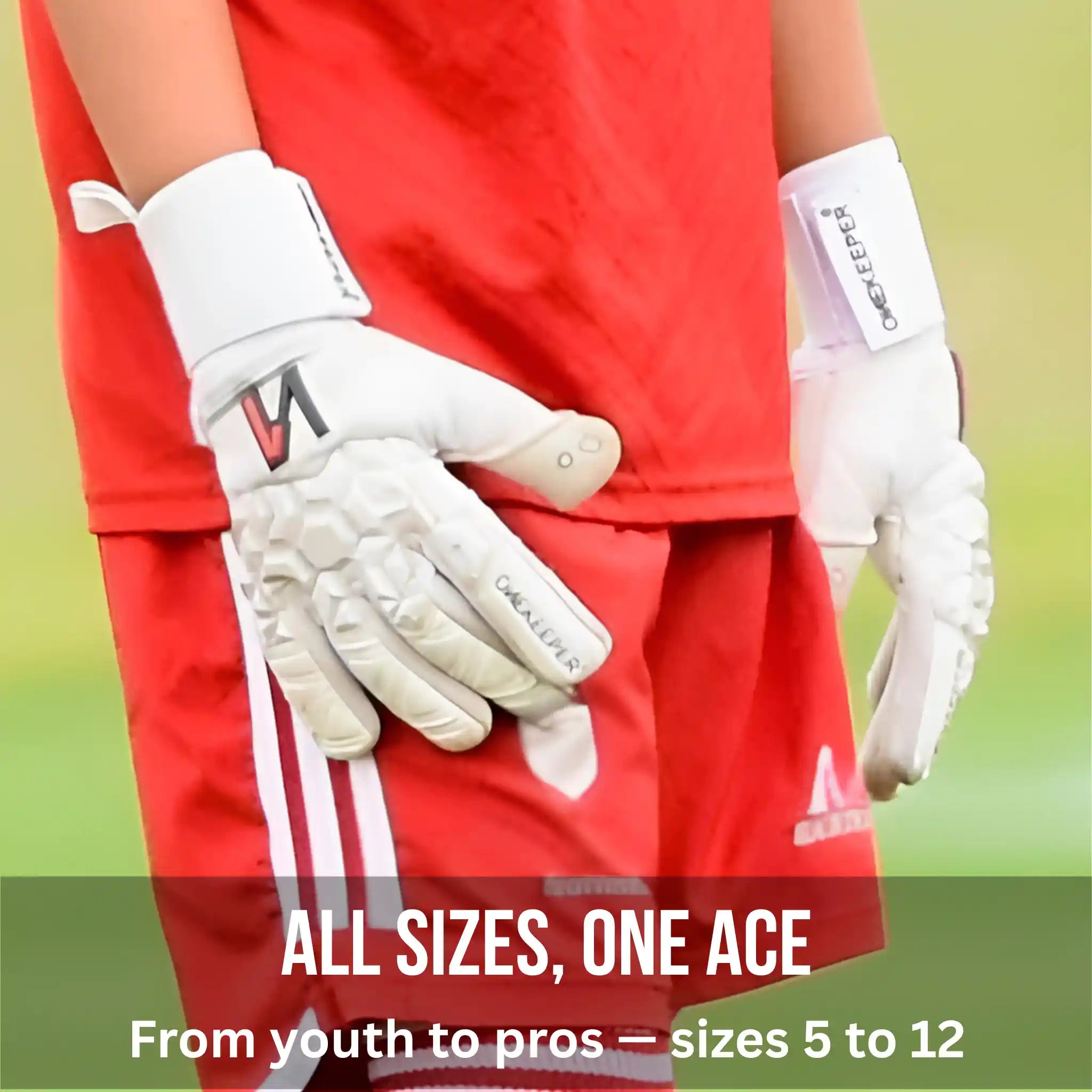 Person wearing red sports attire with a ONEKEEPER ACE white gloves on a blurred green background