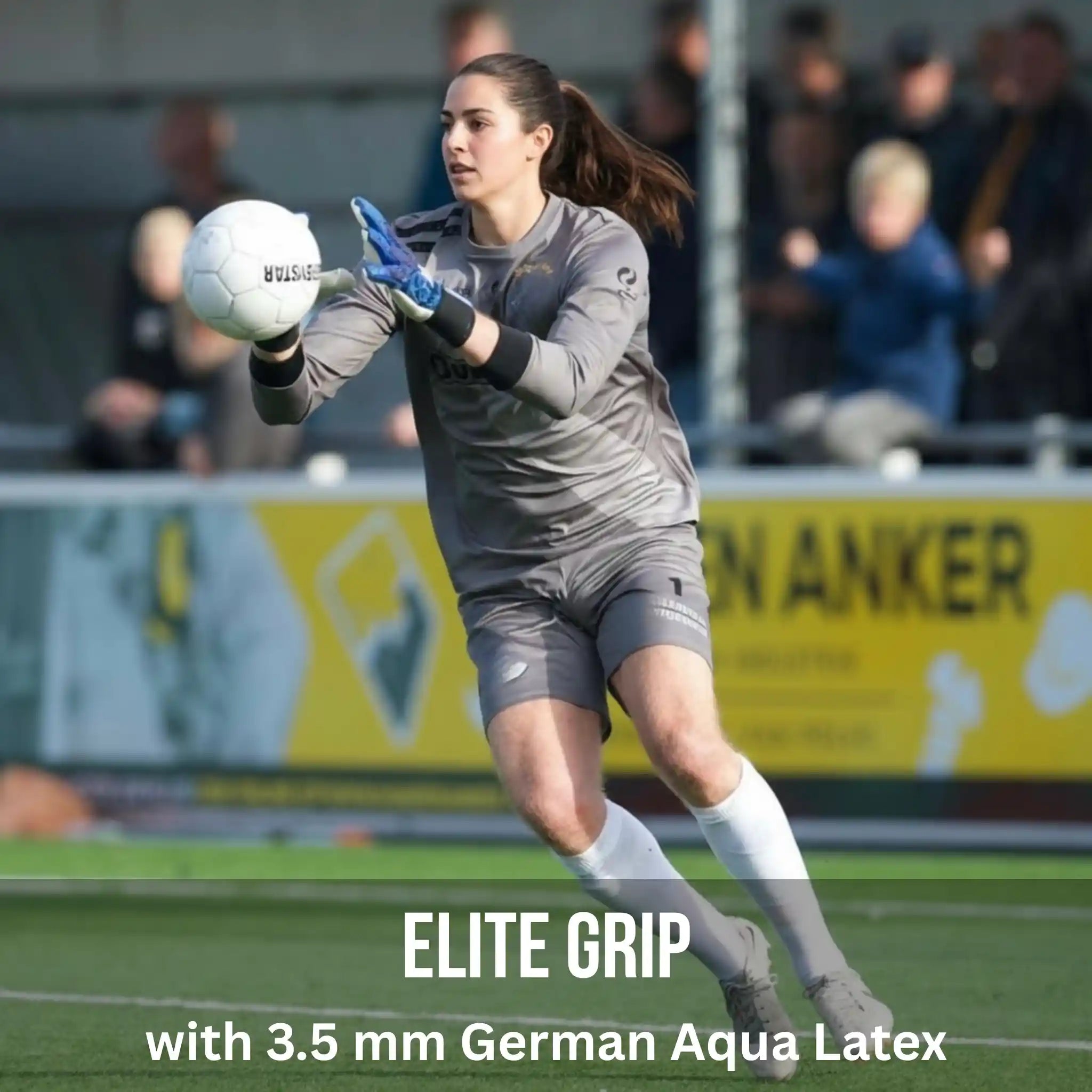Soccer goalkeeper in action on a field with onekeeper c-tec aqua gloves