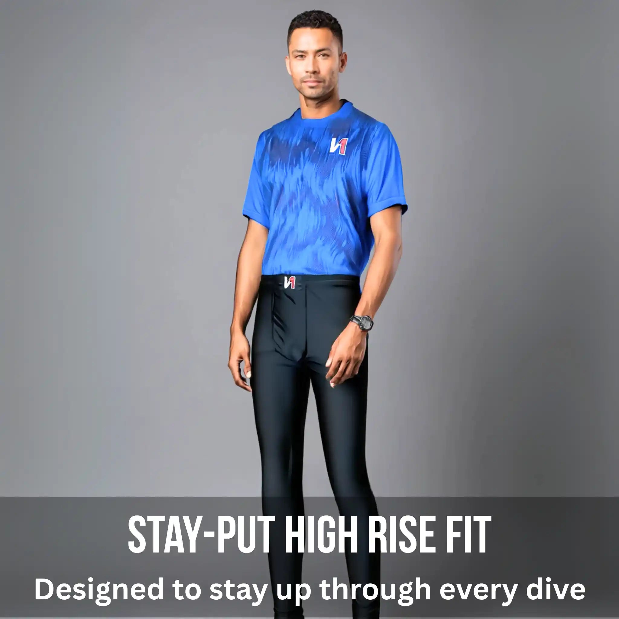 Person wearing a blue shirt and black high-rise goalkeeper leggings on a gray background with text about high rise fit.