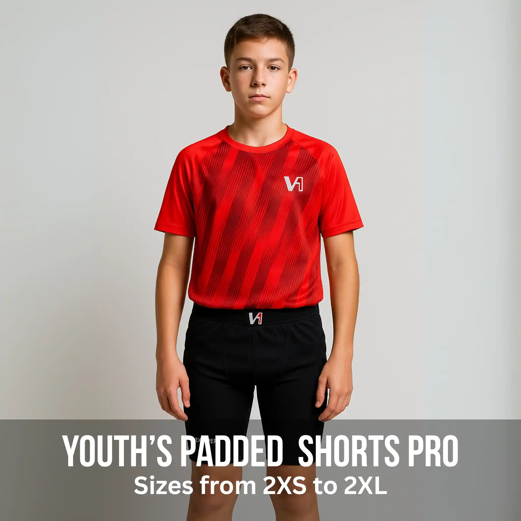 Young person wearing a red sports jersey with a ONEKEEPER compression padded short black
