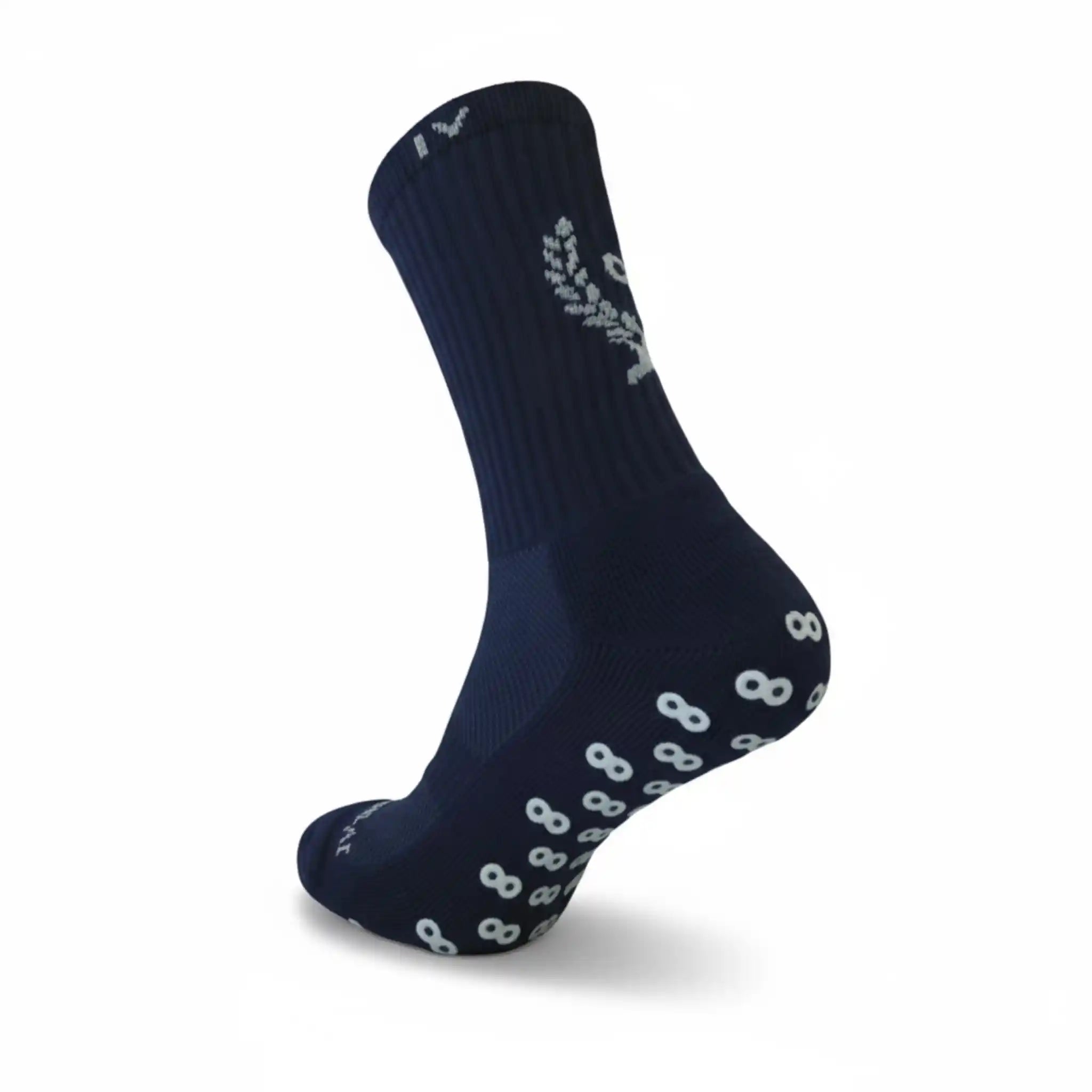 Navy grip sock with white patterns on a white background