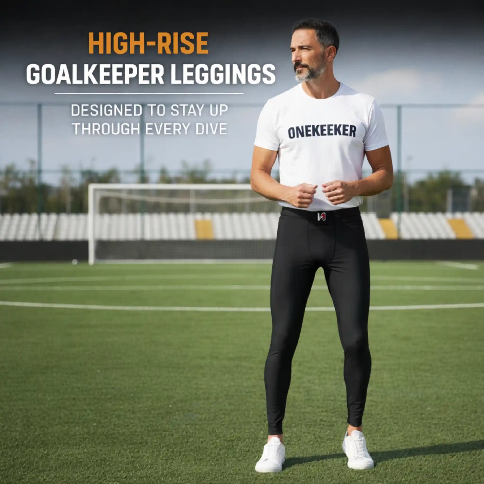 Man wearing onekeeper black high-rise goalkeeper leggings on a soccer field with promotional text.