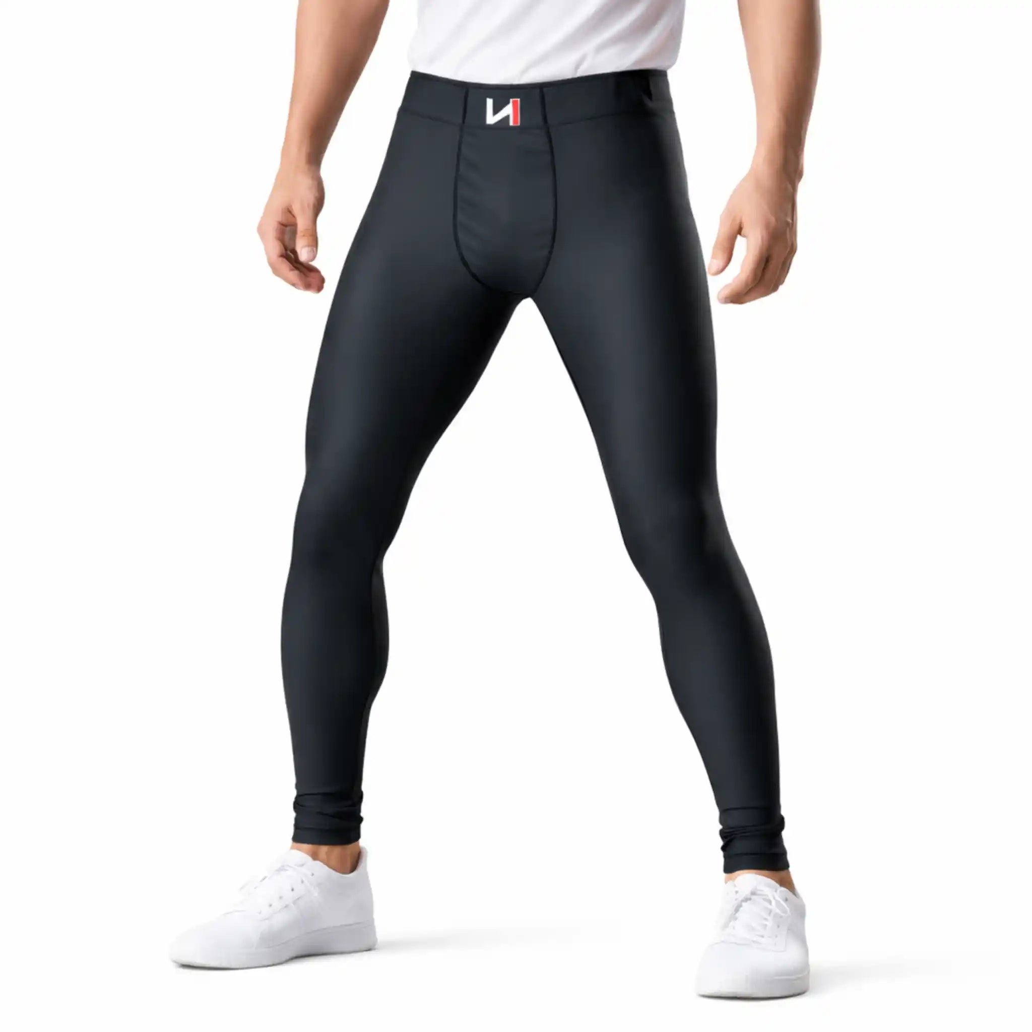 Person wearing ONEKEEPER black leggings with a visible brand logo on a white background