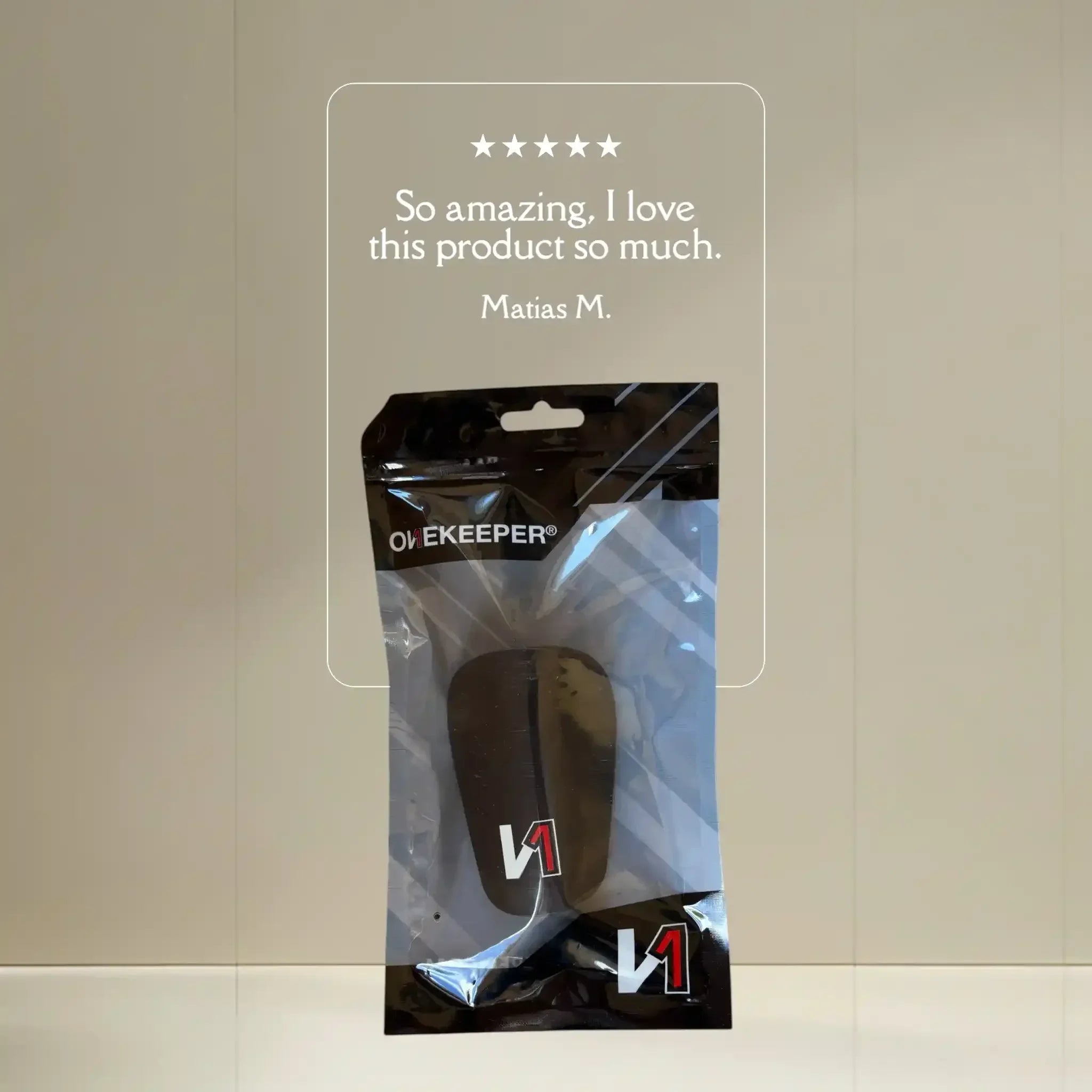 Mini shinguard in clear packaging with customer review and five-star rating displayed.