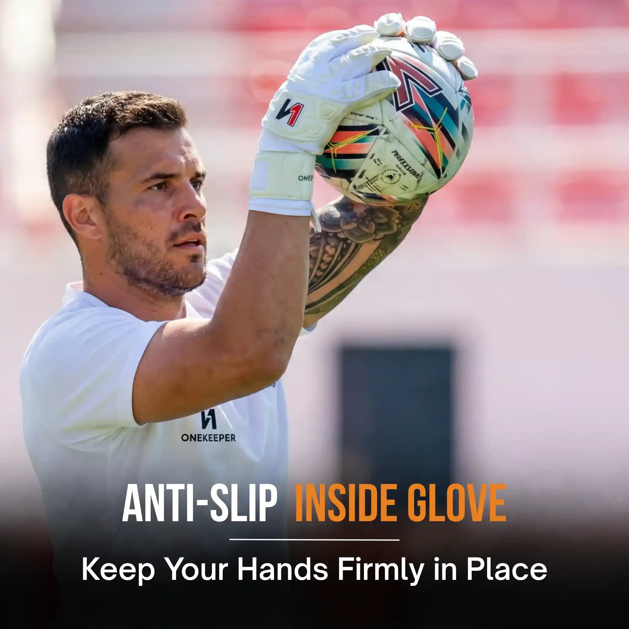 Person wearing a onekeeper solid white goalkeeper glove with text about anti-slip inside glove