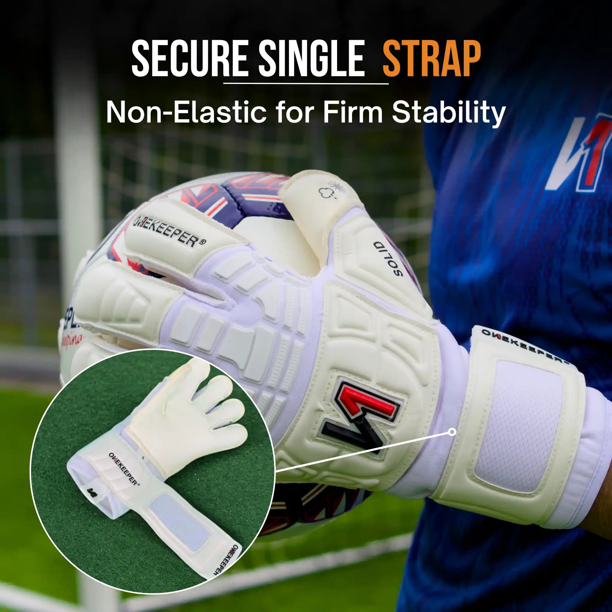 Goalkeeper onekeeper solid white glove with secure single strap feature, worn by a person on a sports field.