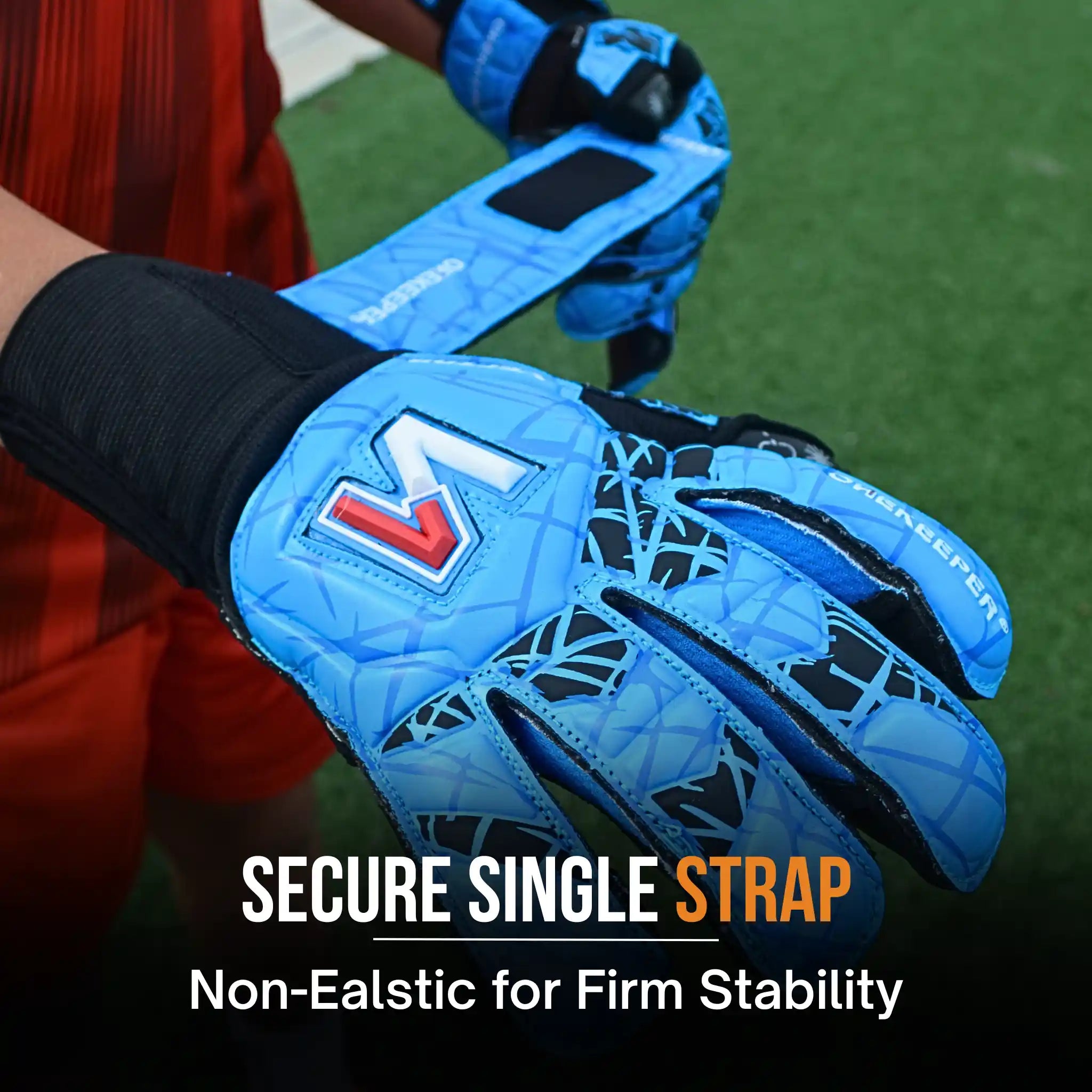 onekeeper vector evolution Blue soccer glove with a secure single strap on a green field background