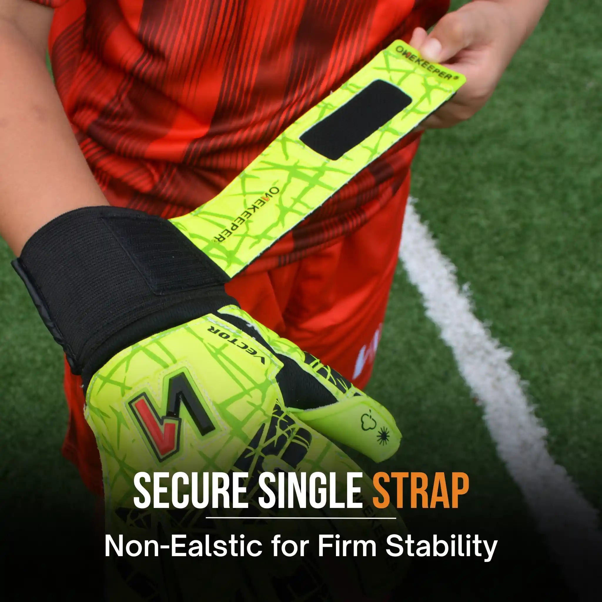 Kids showing the strap of a onekeeper vector evolution neon yellow goalkeeper glove.