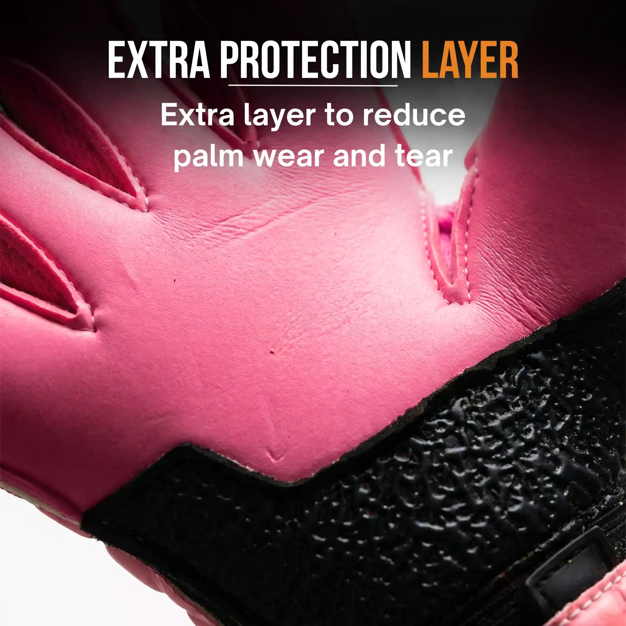 Close-up of a onekeeper vector evolution pink glove with an extra protection layer, highlighting wear and tear reduction.