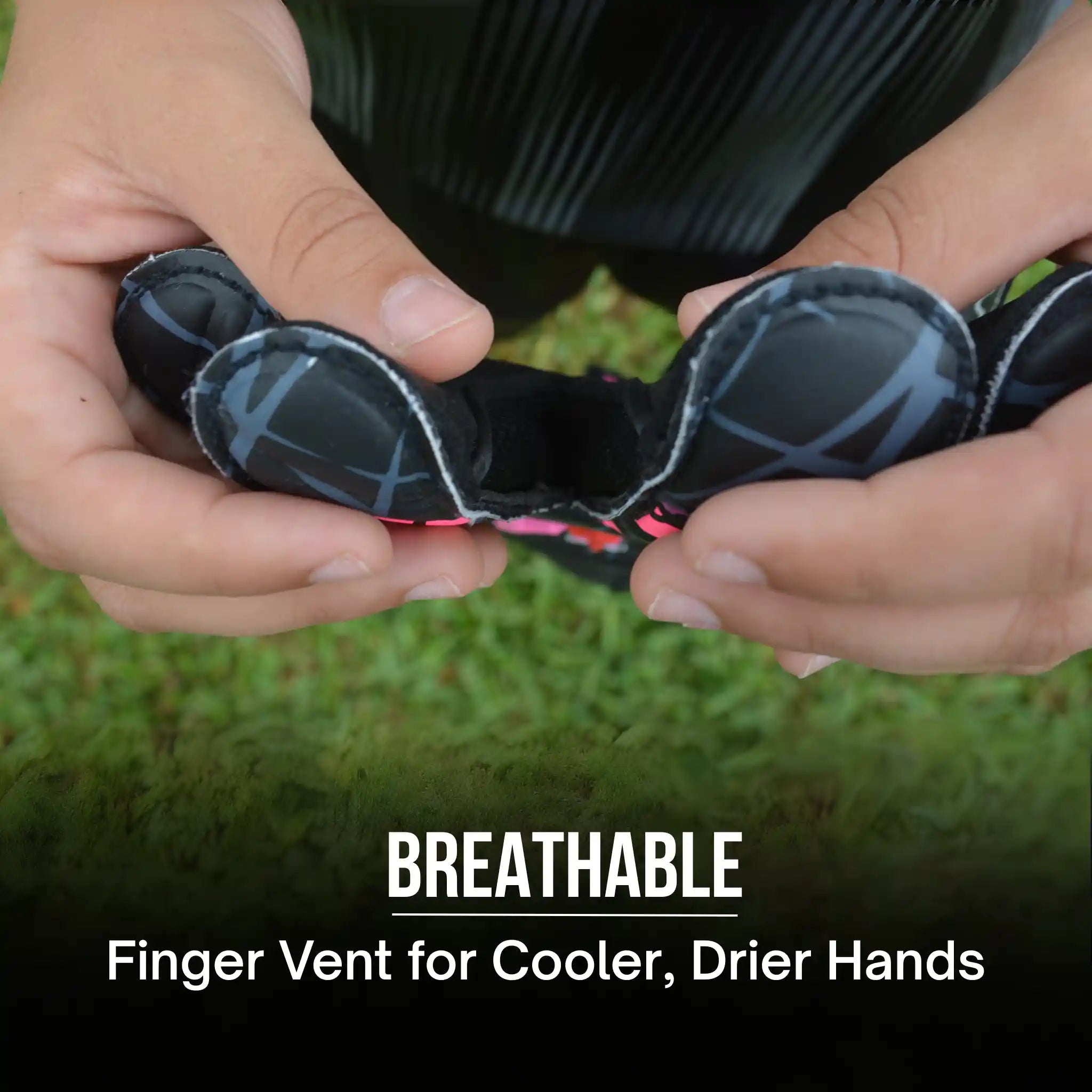 a kid showing the breathable finger of a ONEKEEPER Vector Evolution Black and Purple goalkeeper glove.