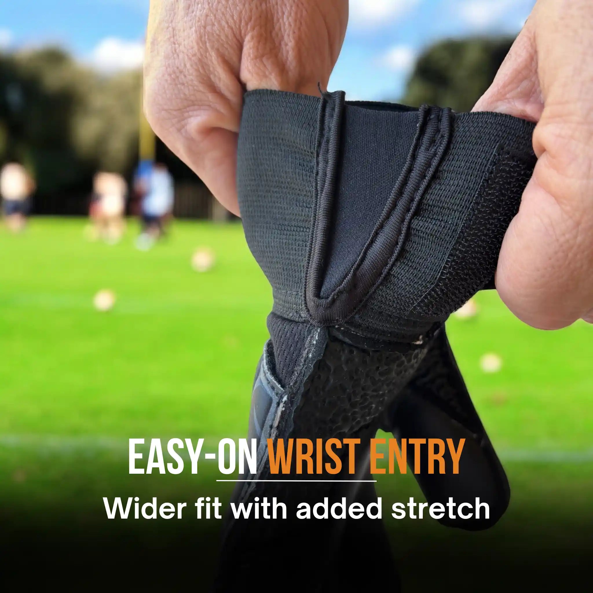 Person showing the easy-on wrist entry of the ONEKEEPER Vector Evolution Black and Purple goalkeeper glove
