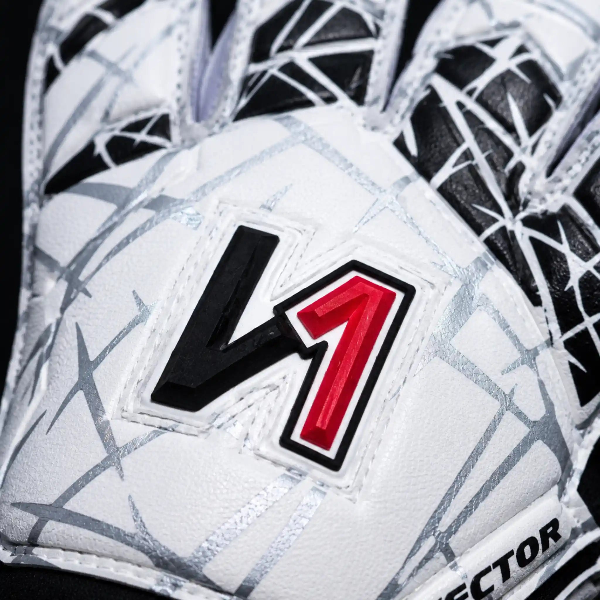 Close-up of a onekeeper vector evolution white and blackl with a prominent 'V1' logo on a black background