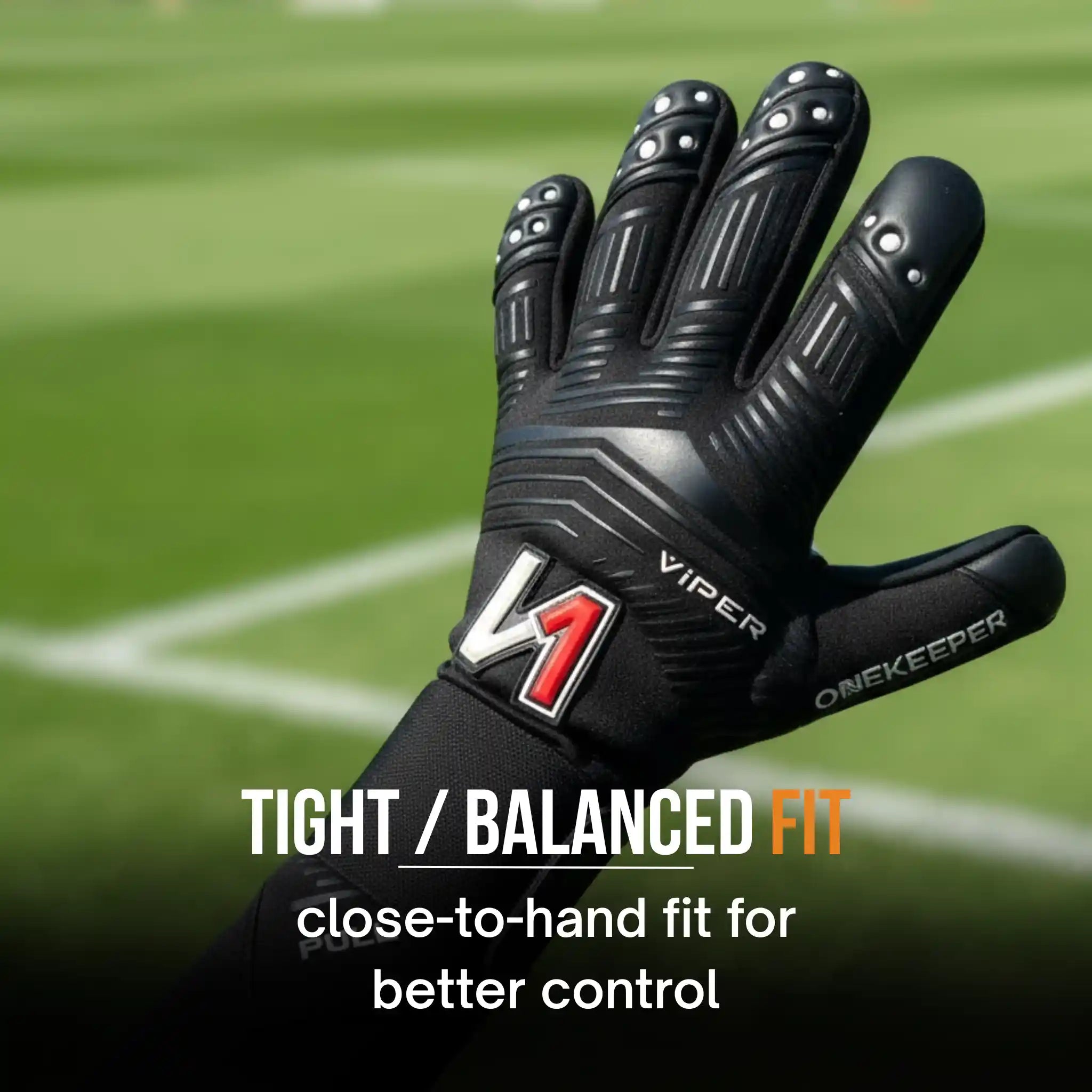 onekeeper viper Black glove with Viper Onekeeper branding on a sports field background