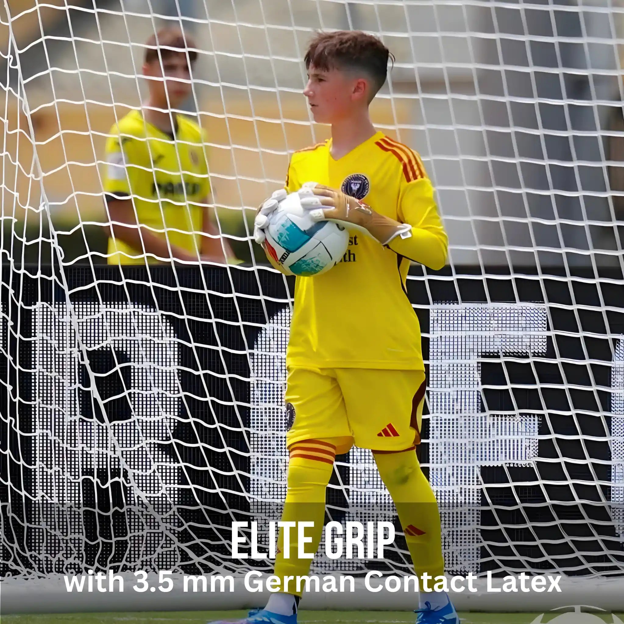 Young soccer goalkeeper in yellow uniform holding a soccer ball in front of a net with a viper gold goalkeeper glove.