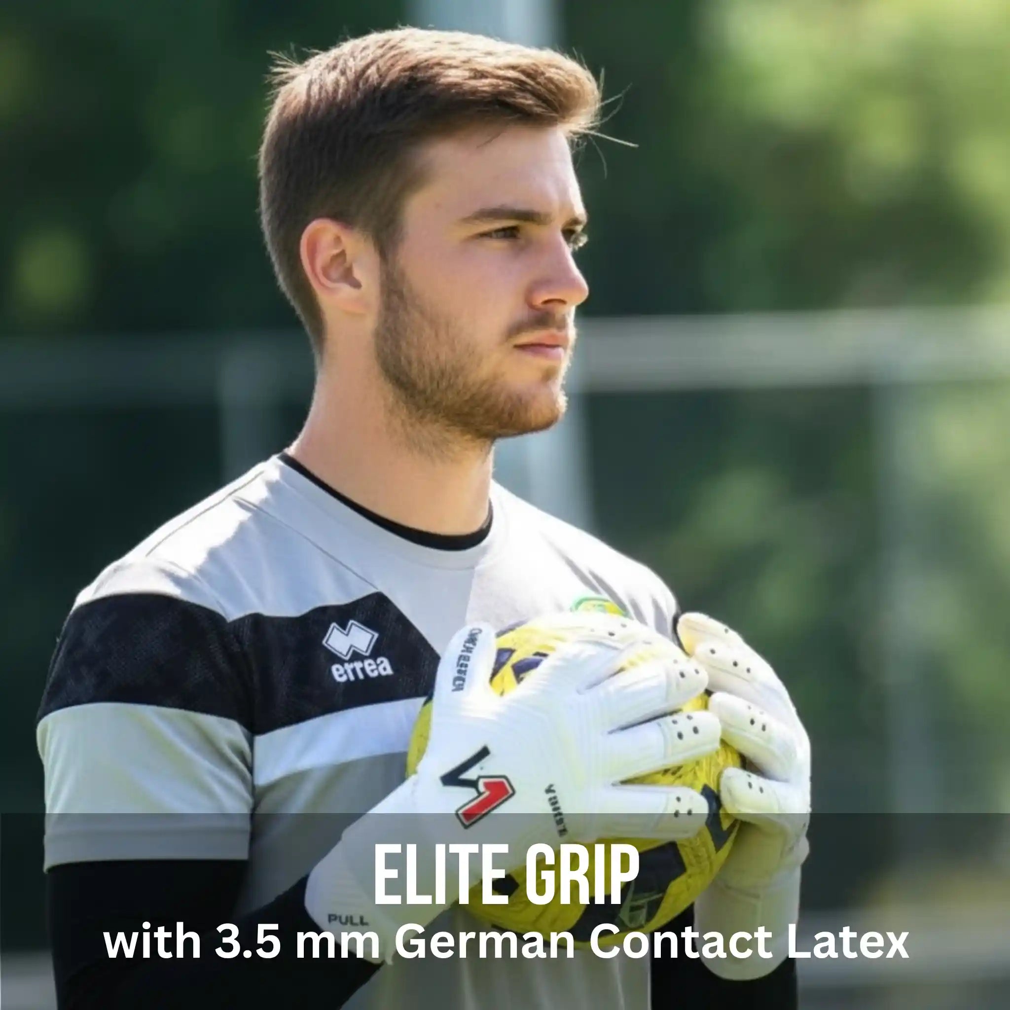 Man holding a soccer ball with a ONEKEEPER Viper White gloves on a sports field