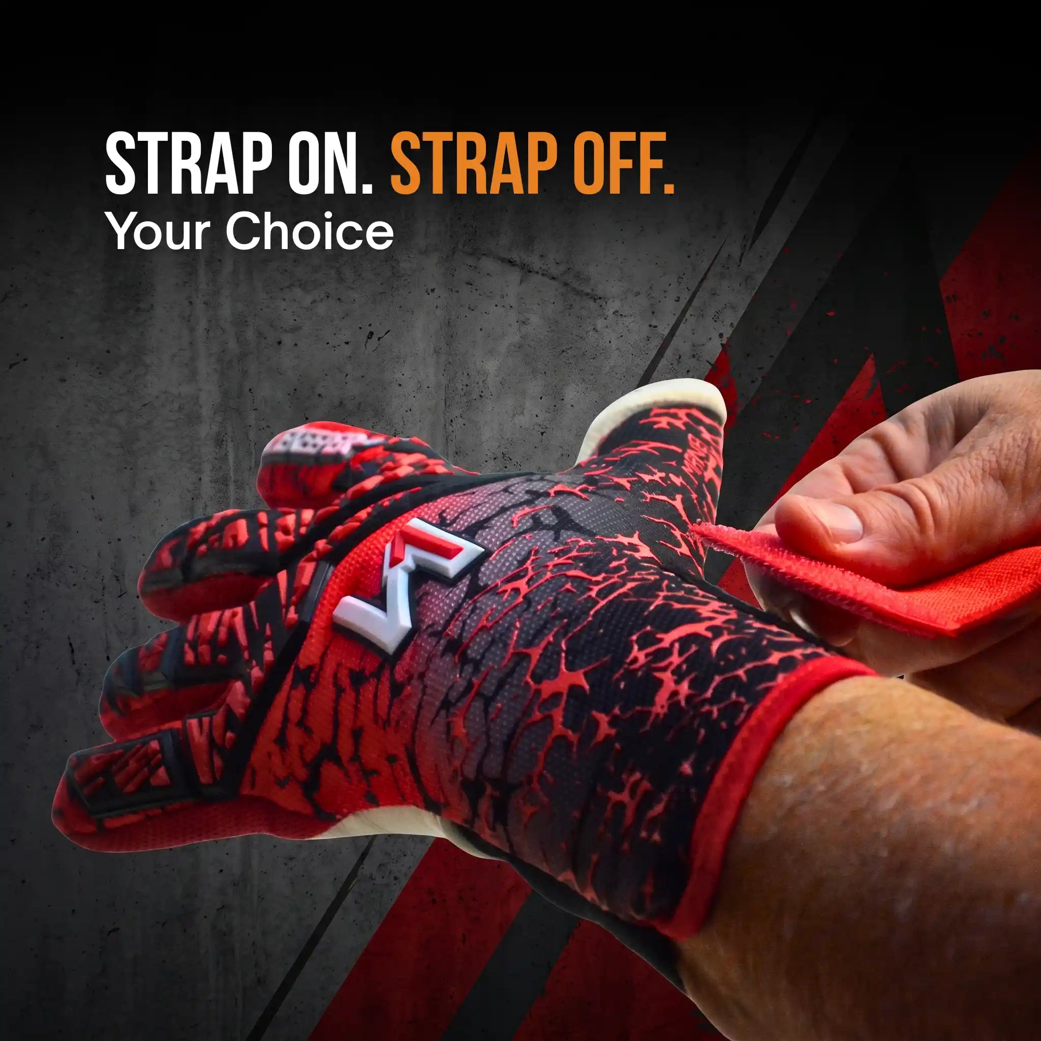 A close-up of a hand wearing a onekeeper mana red and black protective glove with a white logo, while another hand adjusts the red strap. Bold text at the top reads 'STRAP ON.