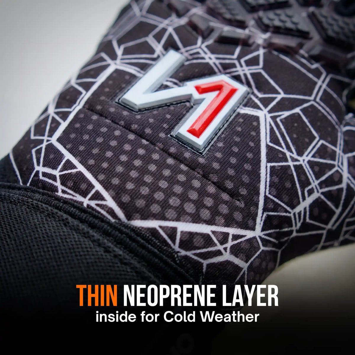Close-up of a onekeeper ctec black and gray patterned glove with a raised stylized '7' logo in silver and red, plus text reading 'THIN NEOPRENE LAYER inside for Cold Weather'.